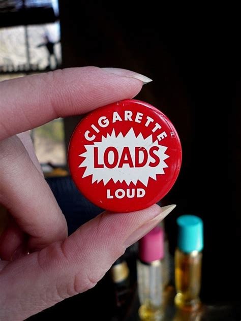 Cigarette loads - Sold Date. Source eBay. The piece is approximately 1 1/4" in diameter and a bit over 1/4" tall. It does show wear and has residue on the bottom. The silver around "LOADS" is scratched out. The tin is empty. Items in the Price Guide are obtained exclusively from licensors and partners solely for our members’ research needs. 